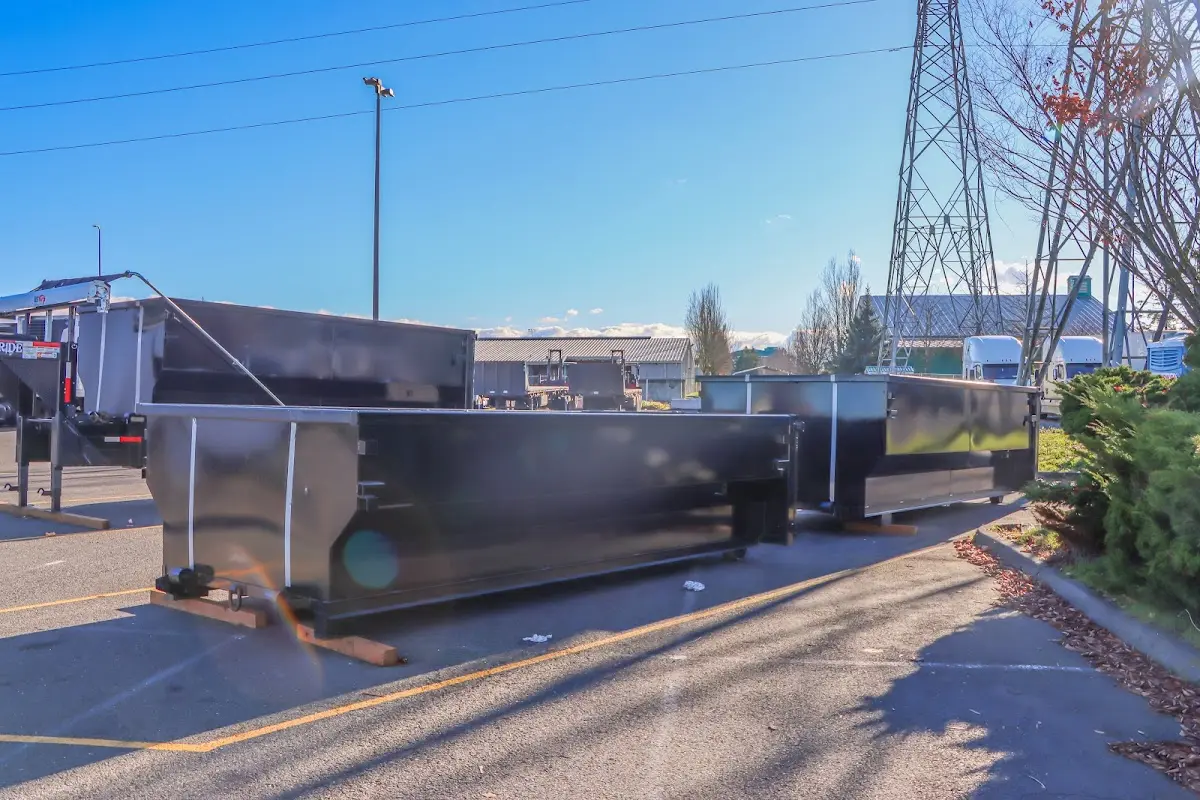 Roll-off dumpster ready for waste disposal at job site for 3 Yard Dumpster Rental in Hiram
